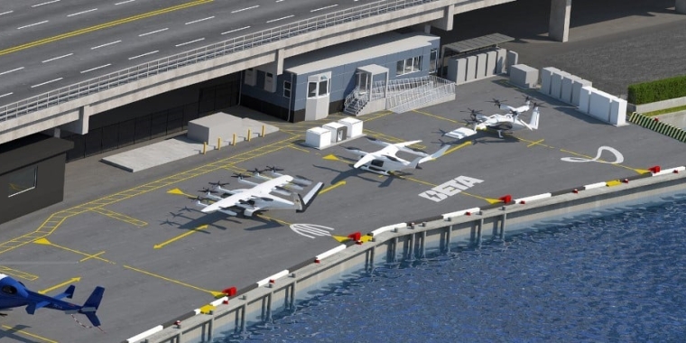 Aerial view of the urban 34th Street Heliport with multiple white eVTOL aircraft parked on marked spots near a modern building, adjacent to a bridge over the waterfront.